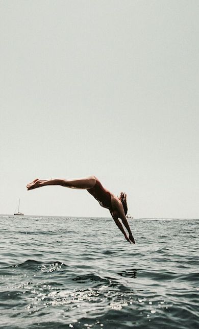 Woman diving into the sea