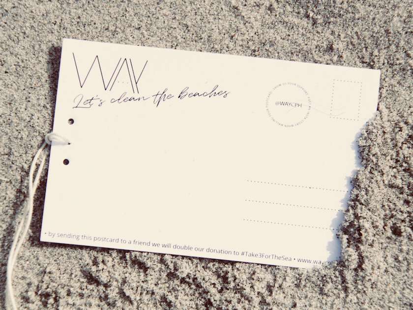 WAY hang tag in sand