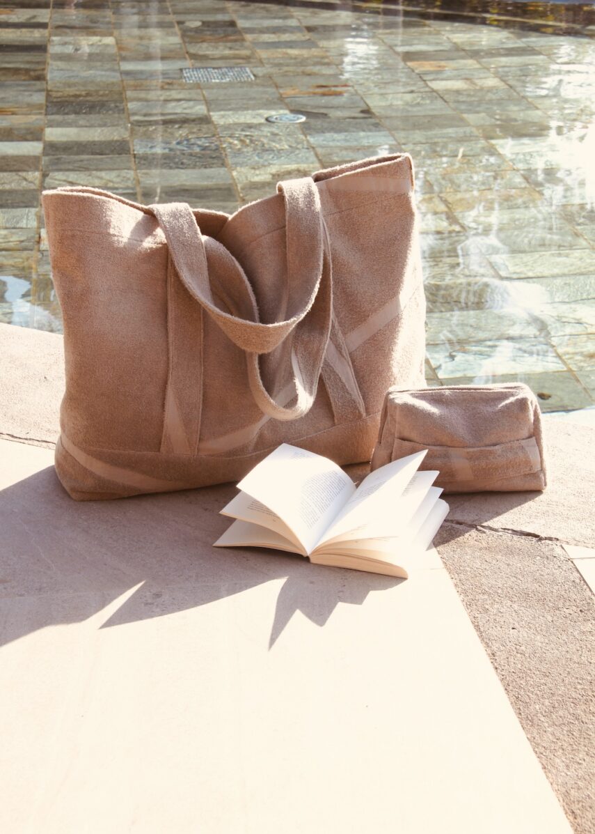 Bossa beach bag in stone From WAY by the pool with a book
