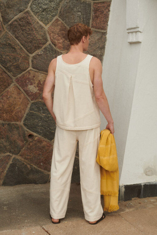 WAY Elba Pants in SHELL cream white on male model from behind