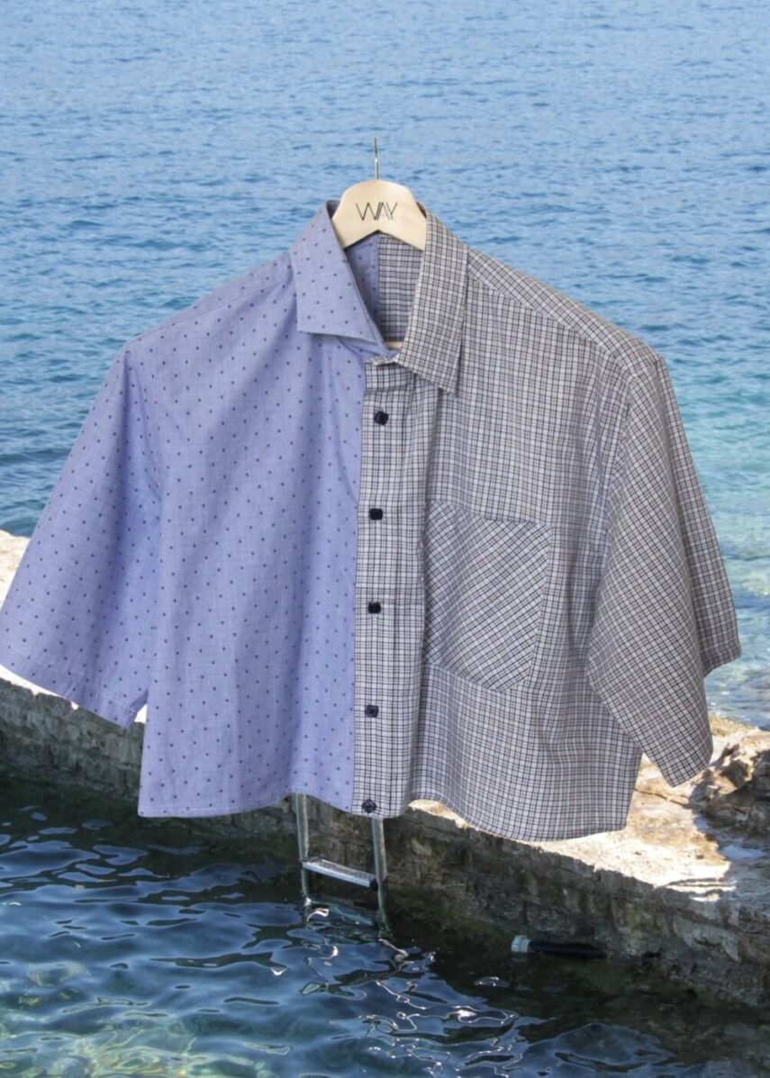 Upcycled blue striped SUN Crop Shirt from WAY collaboration with Salvation Army with ocean back ground