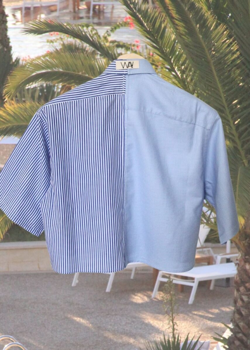 Upcycled blue striped SUN Crop Shirt from WAY collaboration with Salvation Army with pool back ground