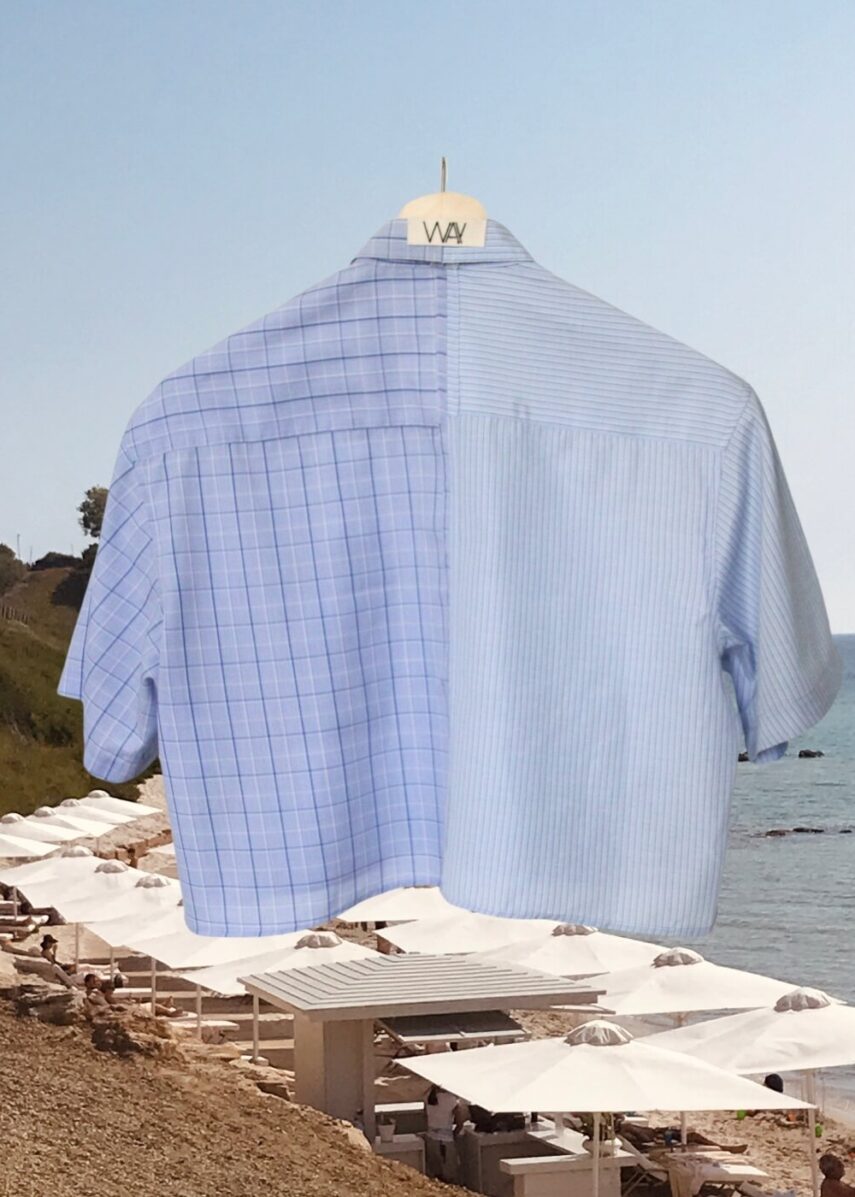 Upcycled blue striped SUN Crop Shirt from WAY collaboration with Salvation Army with ocean back ground