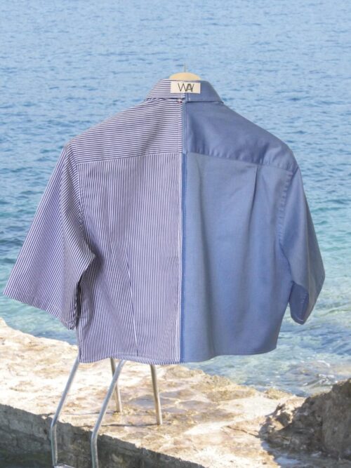 Upcycled blue striped SUN Crop Shirt from WAY collaboration with Salvation Army with ocean back ground